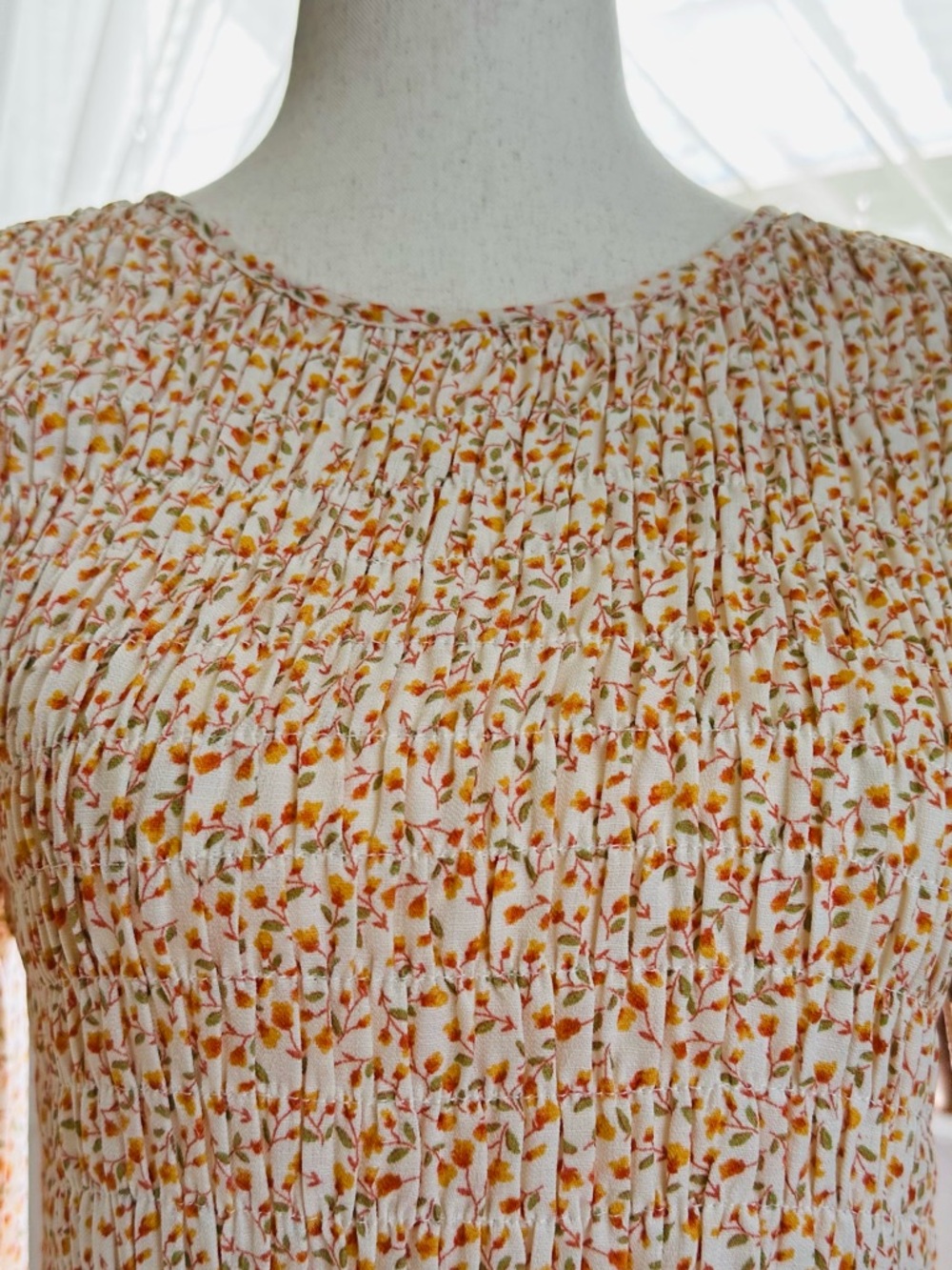 Lumiere long sleeve feminine Floral Print Smocked Peplum Top. 
Size: Small - Picture 2 of 11